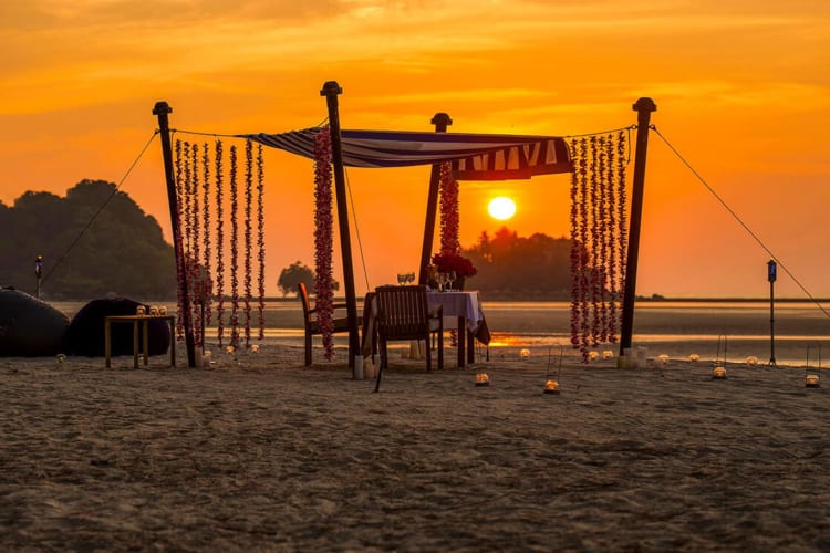 Romantic Dinner Feet in the Sand
